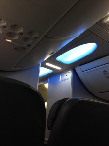 the inside of an airplane with a blue light