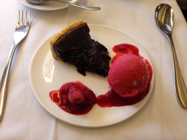 Warm chocolate tart with raspberry sorbet