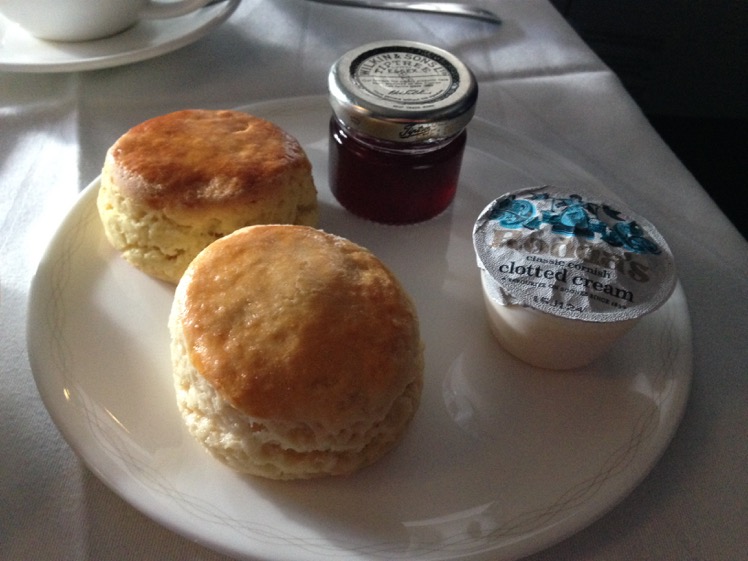 Scones served warm with clotted cream and strawberry preserves