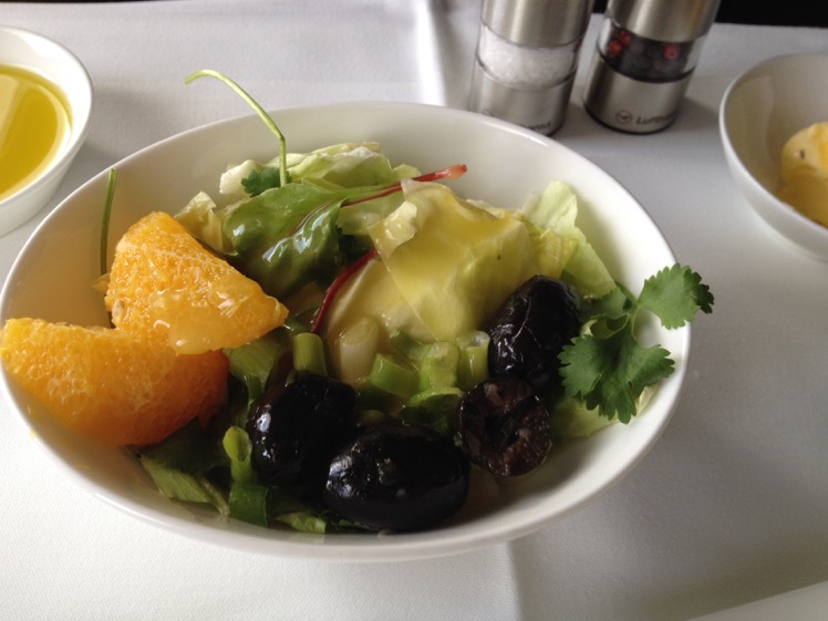 Mixed Salad with Orange, Olives and young Onions with Passion Fruit Dressing