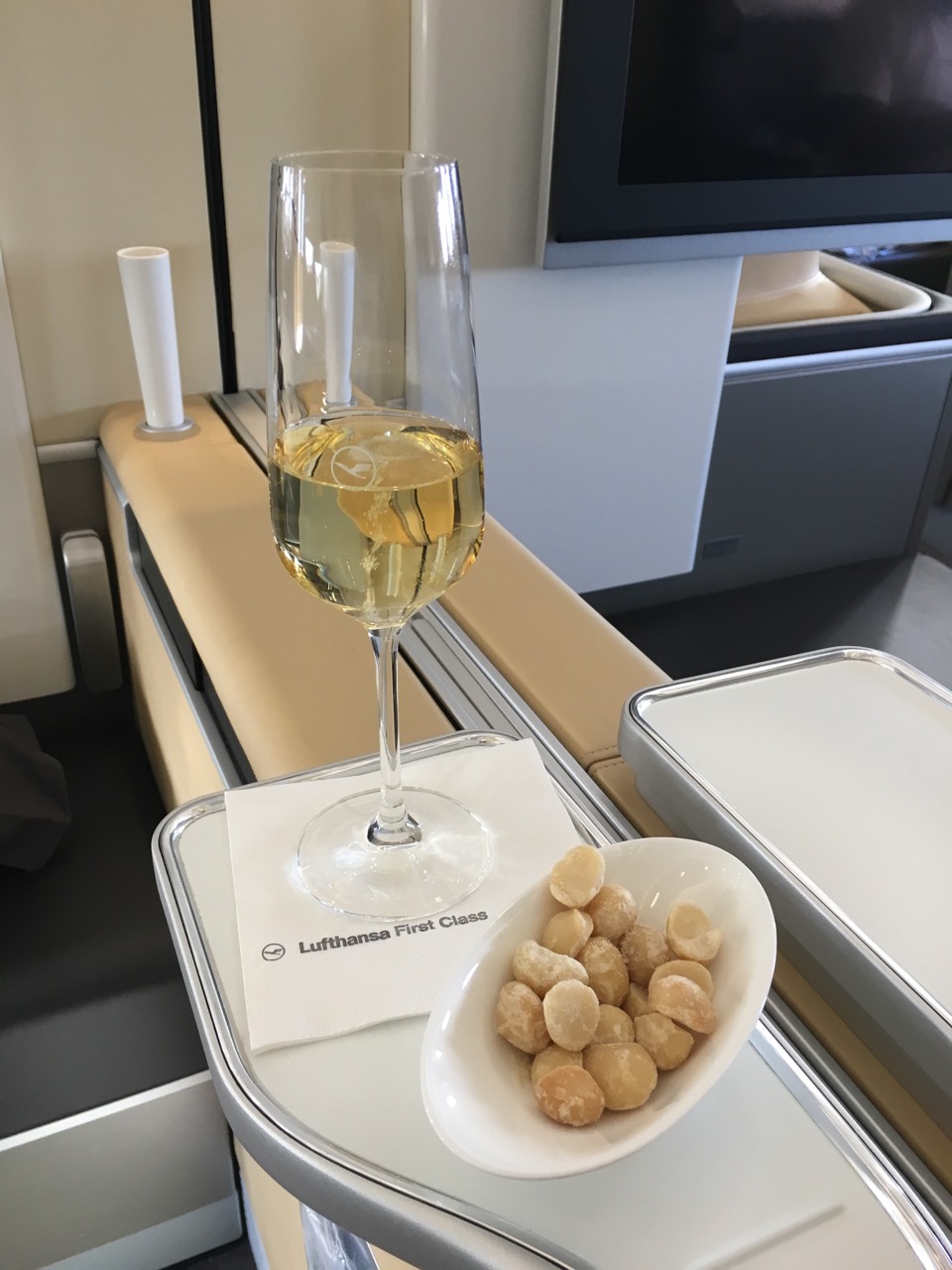 Lufthansa First Class Champagne and Macadamia Nuts